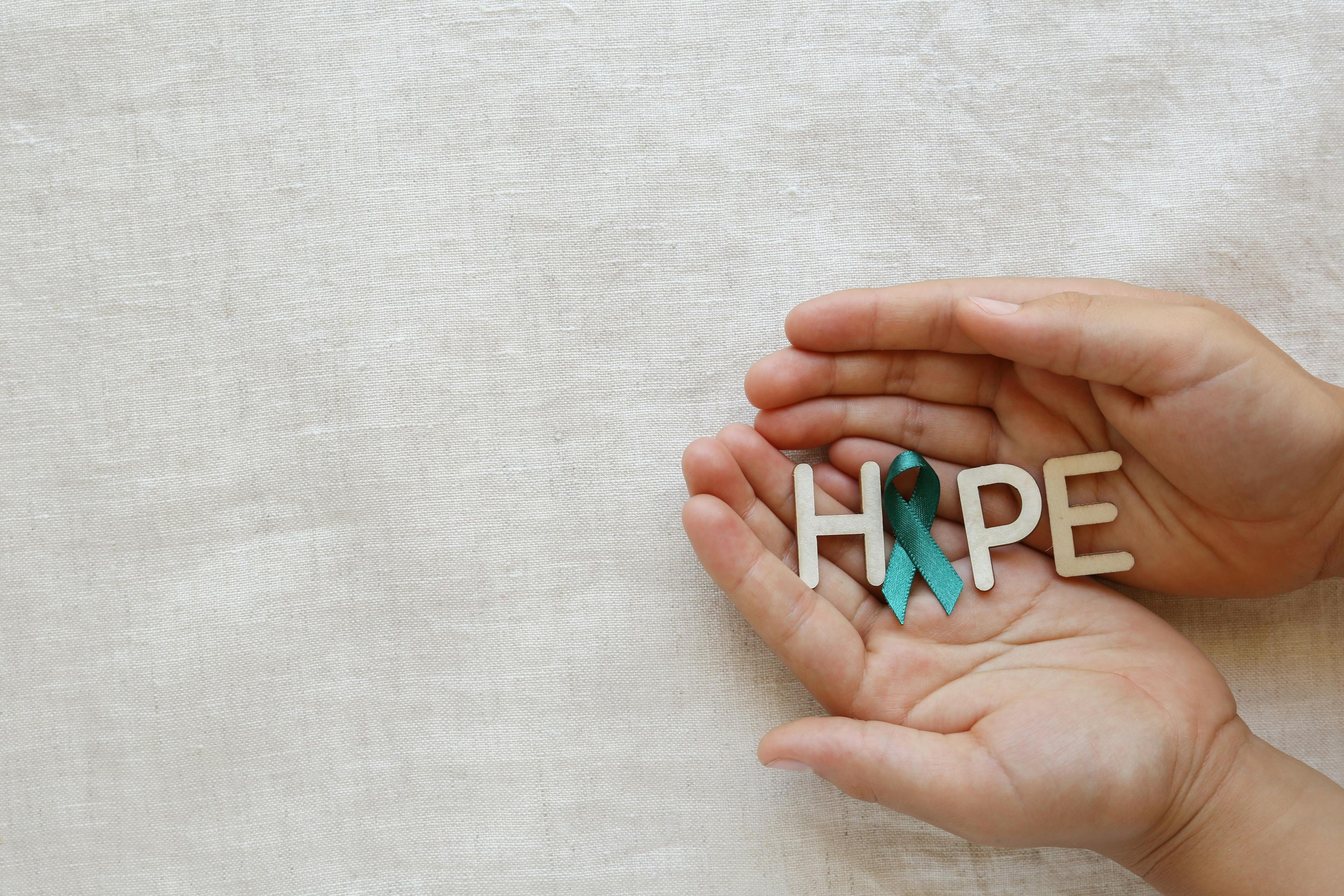 image of "hope" in a pair of hands.