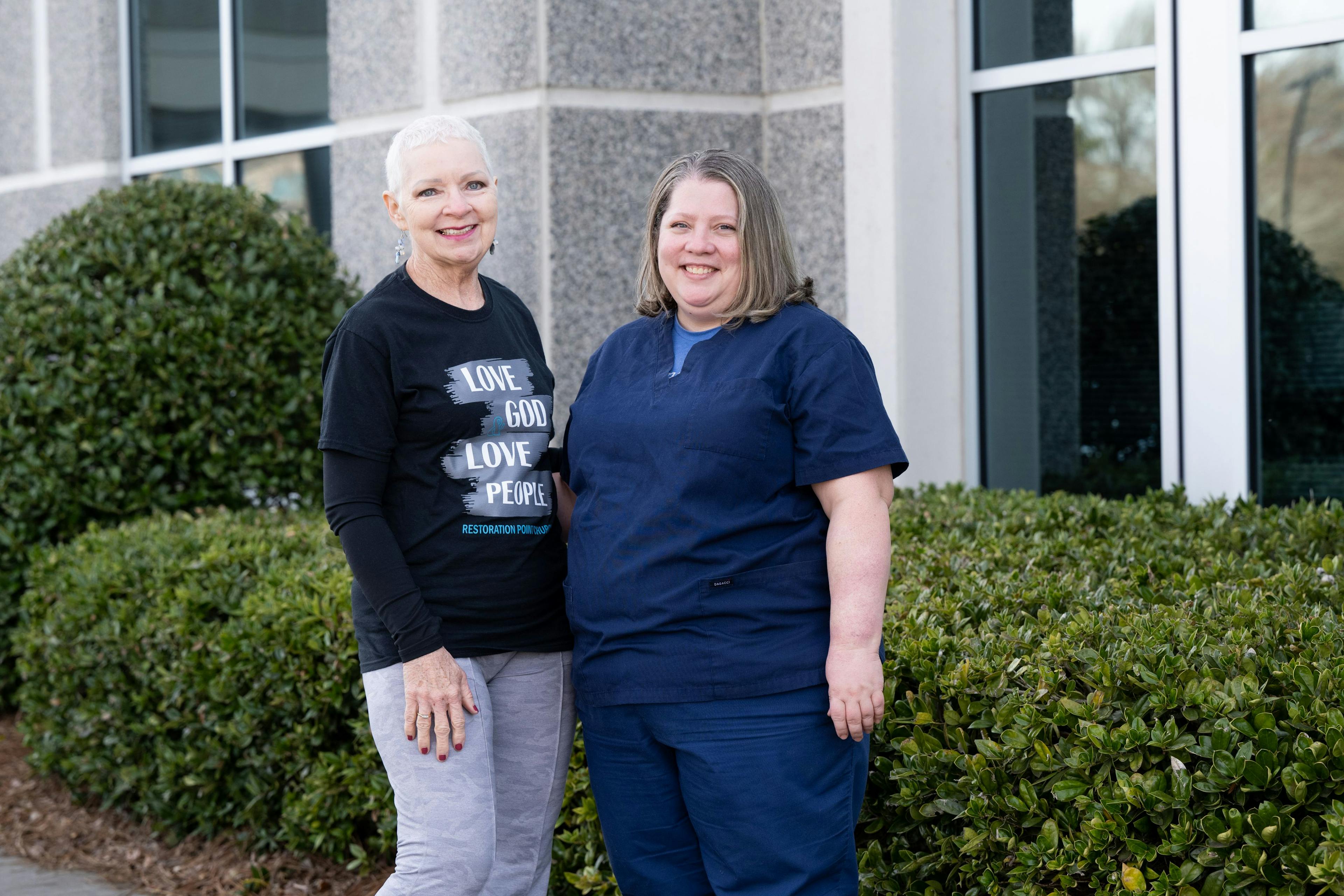 Jessica Krousel (right) stands alongised her nominator, Phyllis Hill, outside of the Levine Cancer Institute in Charlotte, North Carolina. 