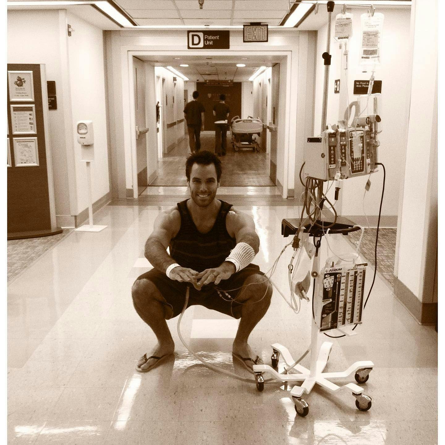 Rory Mckernan about two weeks after undergoing surgery on his lung, exercising in the hospital hallway