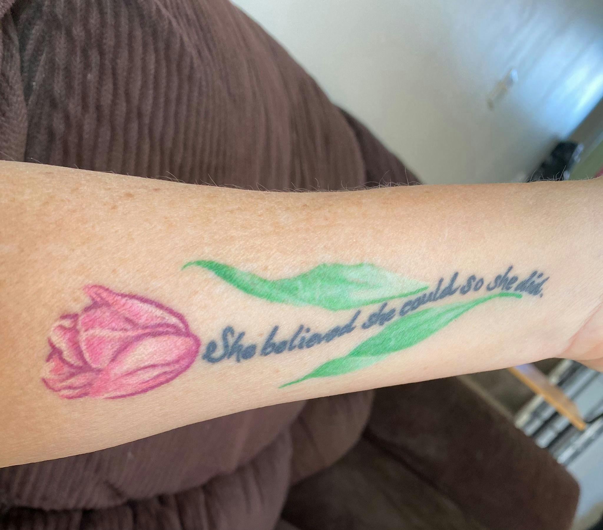 Author Debbie Legault's tattoo to commemorate the end of her daughter's cancer treatments.