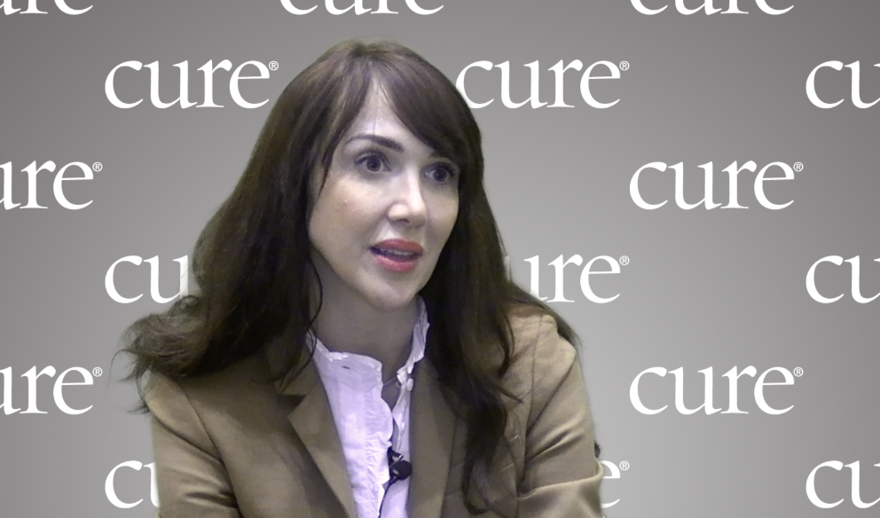 Woman with dark brown hair and pink lipstick wearing a light pink blouse with a light brown blazer. Patients should have conversations with their providers about treatments after receiving diagnoses.