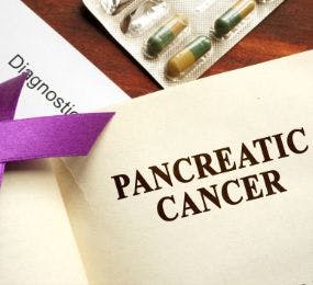 open book with the words "Pancreatic cancer" displayed on the page 