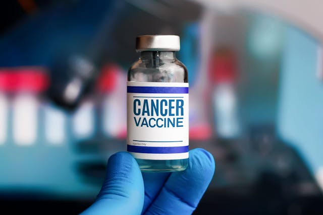Experimental cancer vaccine vial for immunization against Cancer disease. Doctor with vial of the Cancer vaccine | Image credit: © angellodeco - © stock.adobe.com 