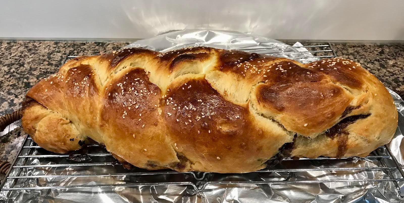 A fresh-baked braided challah bread