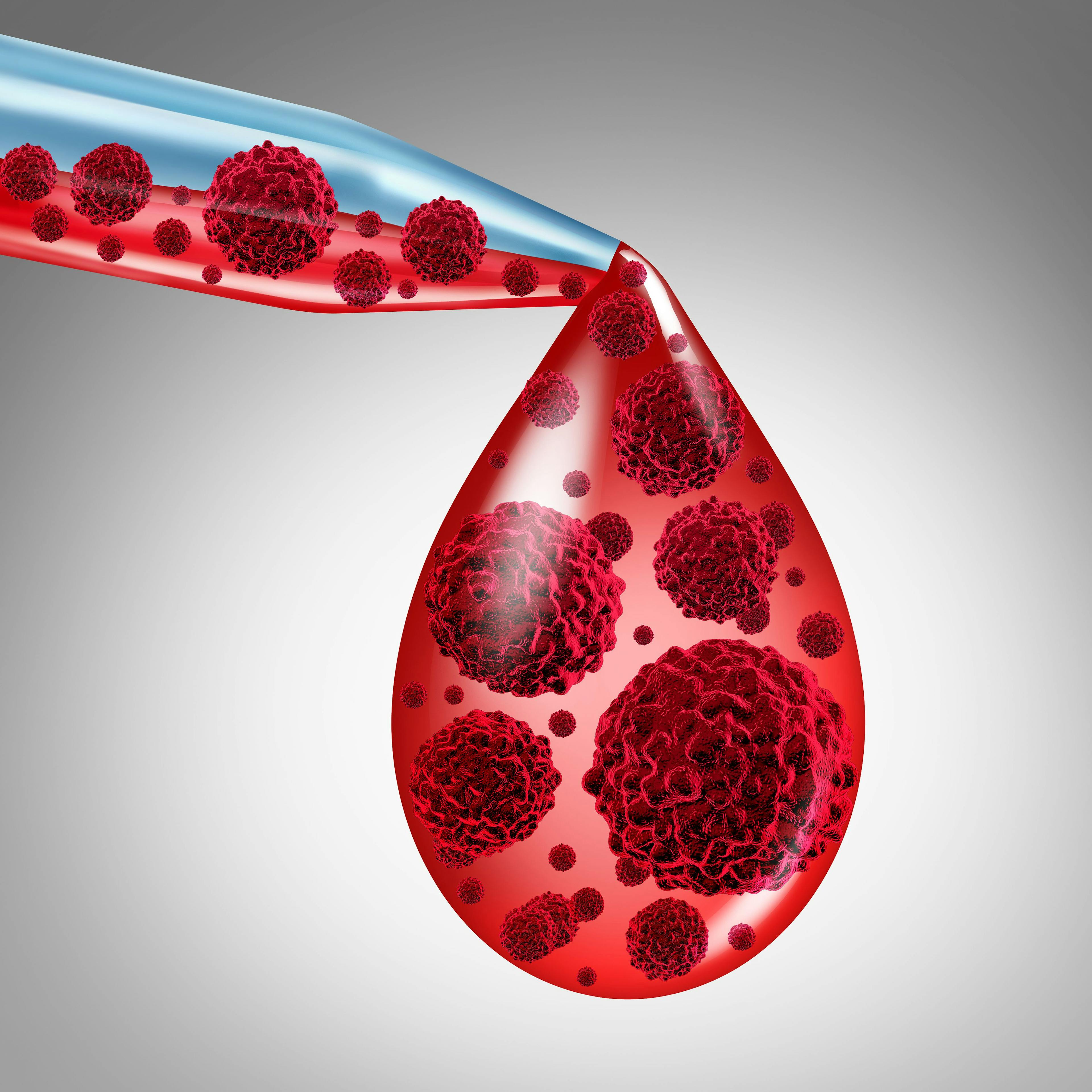 A dropper with blood and visible blood cells.