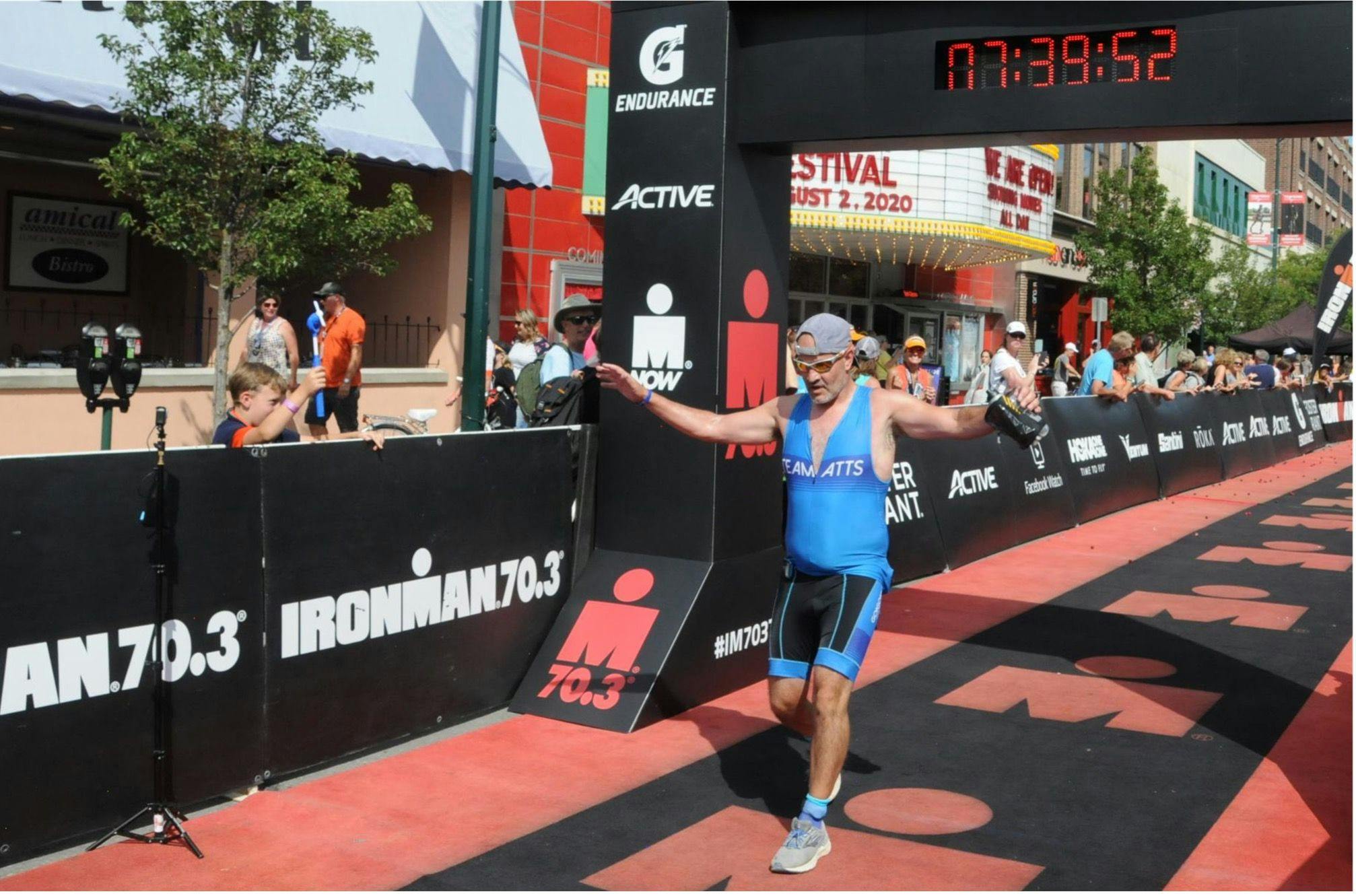Cancer survivor Robert Atteberry completing the 2019 Ironman 70.3 Traverse City