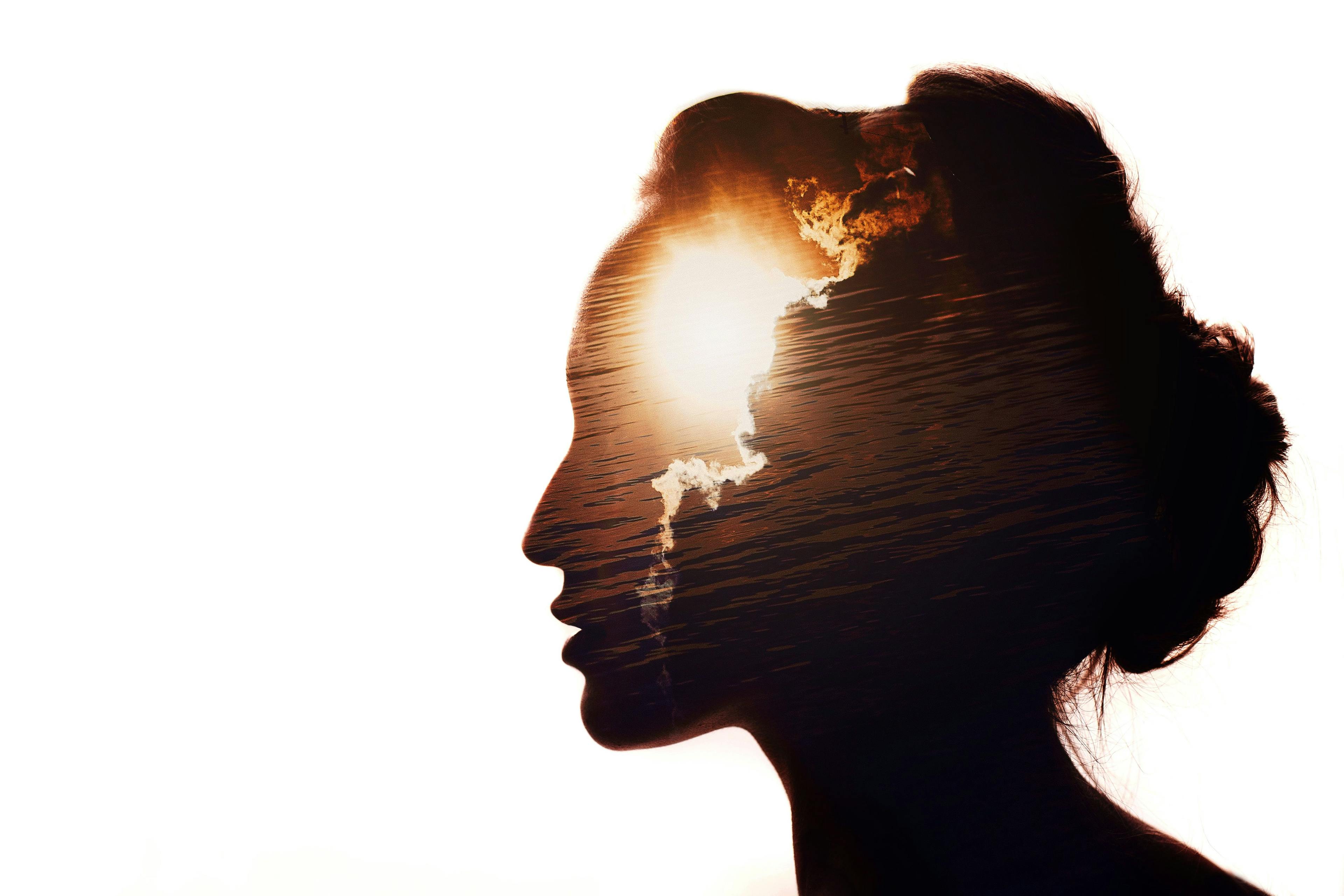Multiple exposure portrait of a woman. The sun behind the clouds. Emotional intelligence concept. | Image credit: © - primipil -© - stock.adobe.com