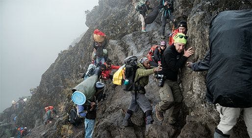 Climbers battled the changing climate and terrain of Mount Kilimanjaro with the help of local guides and porters, who helped carry equipment.- PHOTOS BY UNCAGE THE SOUL PRODUCTIONS