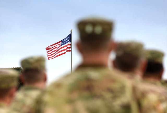 American Soldiers and US Flag. US Army | Image credit: © Bumble Dee - © - stock.adobe.com
