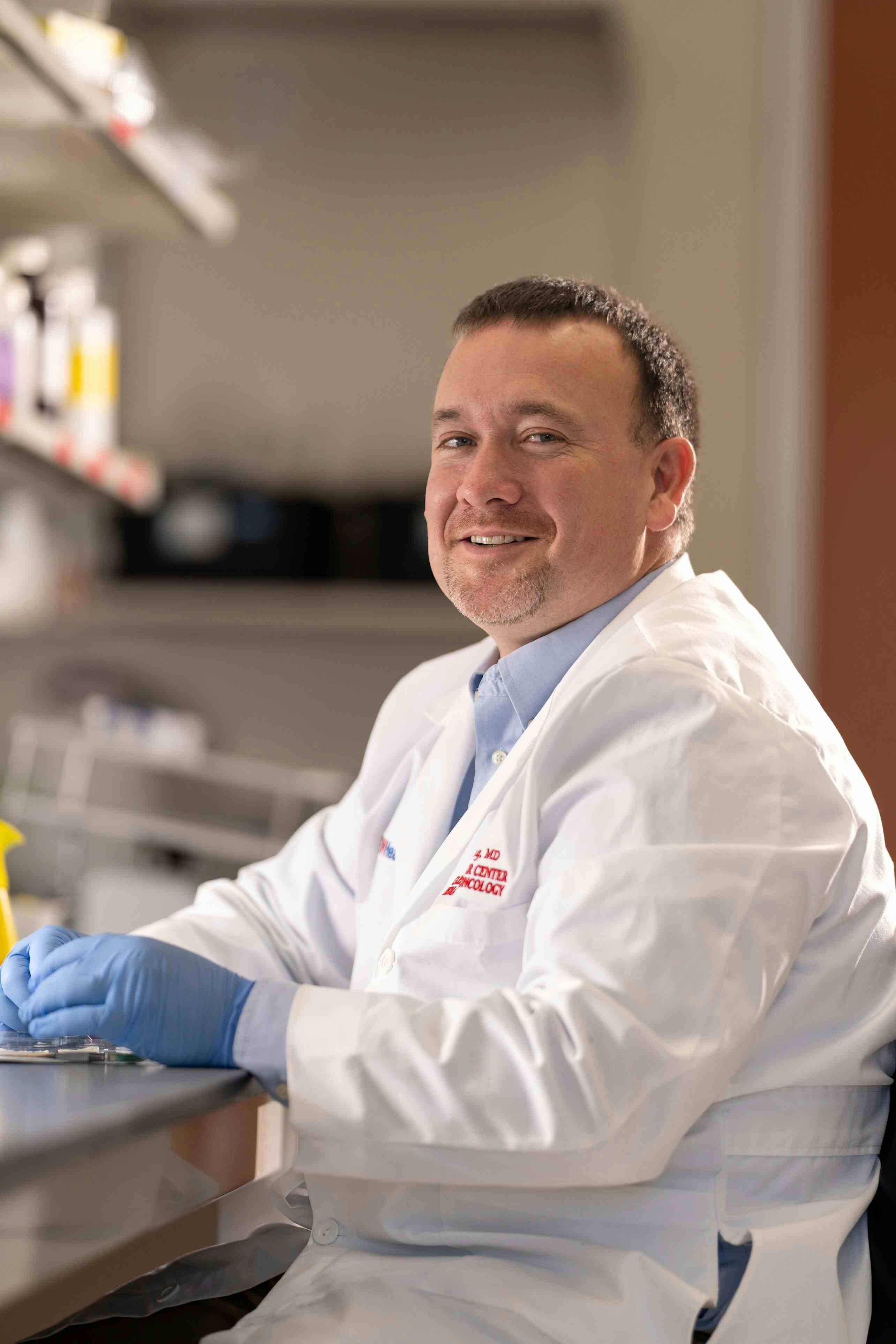 Dr. Dusty Deming in the lab.   Photo courtesy of UW Health