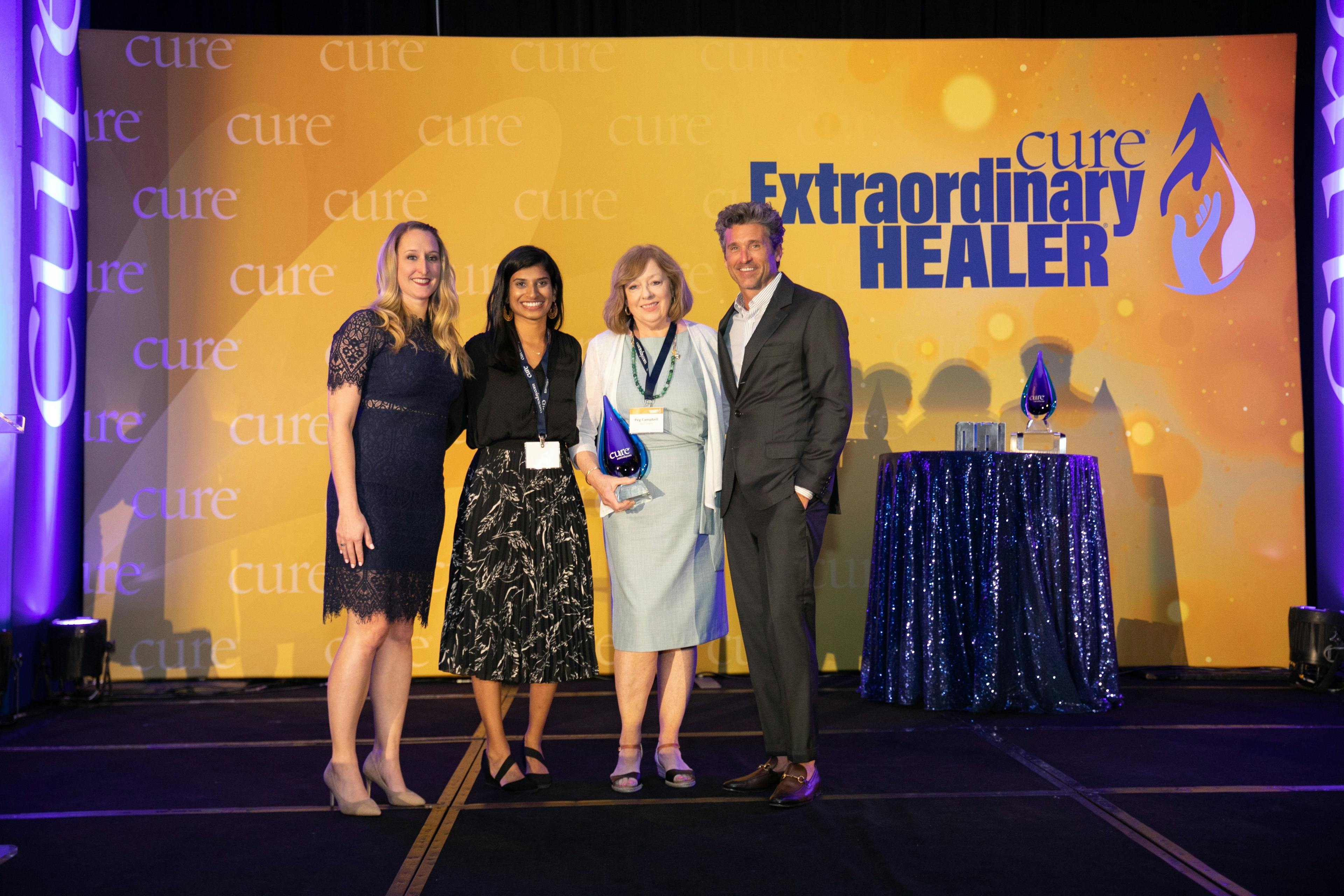 Margaret Campbell, B.S.N., RN, is joined by friend Nikita Patel, Kristie L. Kahl, vice president of content at MJH Life Sciences, and award-winning actor, producer and cancer advocate, Patrick Dempsey.

From left: Kristie Kahl, Nikita Patel, Margaret Campbell, B.S.N., RN, Patrick Dempsey. 