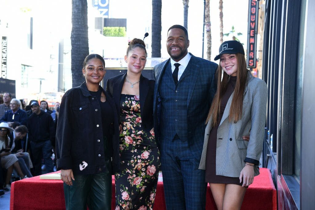Michael Strahan and his daughters. From left to right, Tanita, Sophia, Michael and Isabella. Credit: JC Olivera / Getty Images 