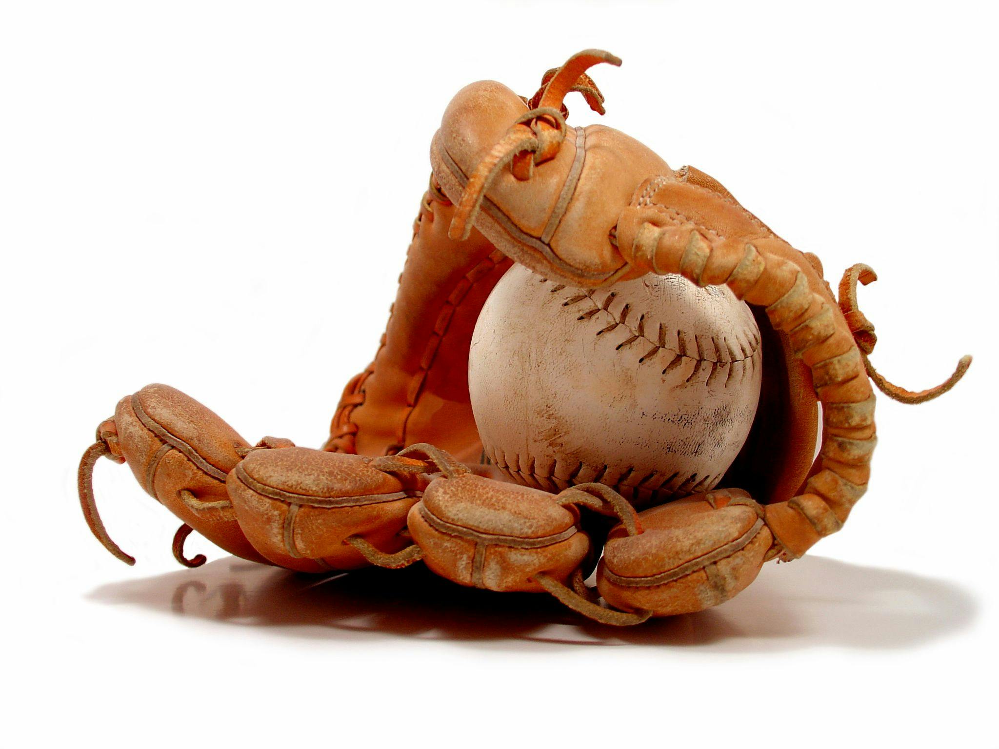 baseball glove with baseball inside