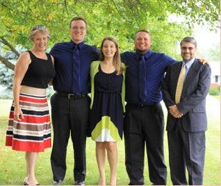 Left to right: mom, me, my sister, my brother, and my dad.