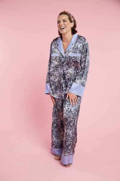 Lorelei colbert modeling in purple floral pajamas