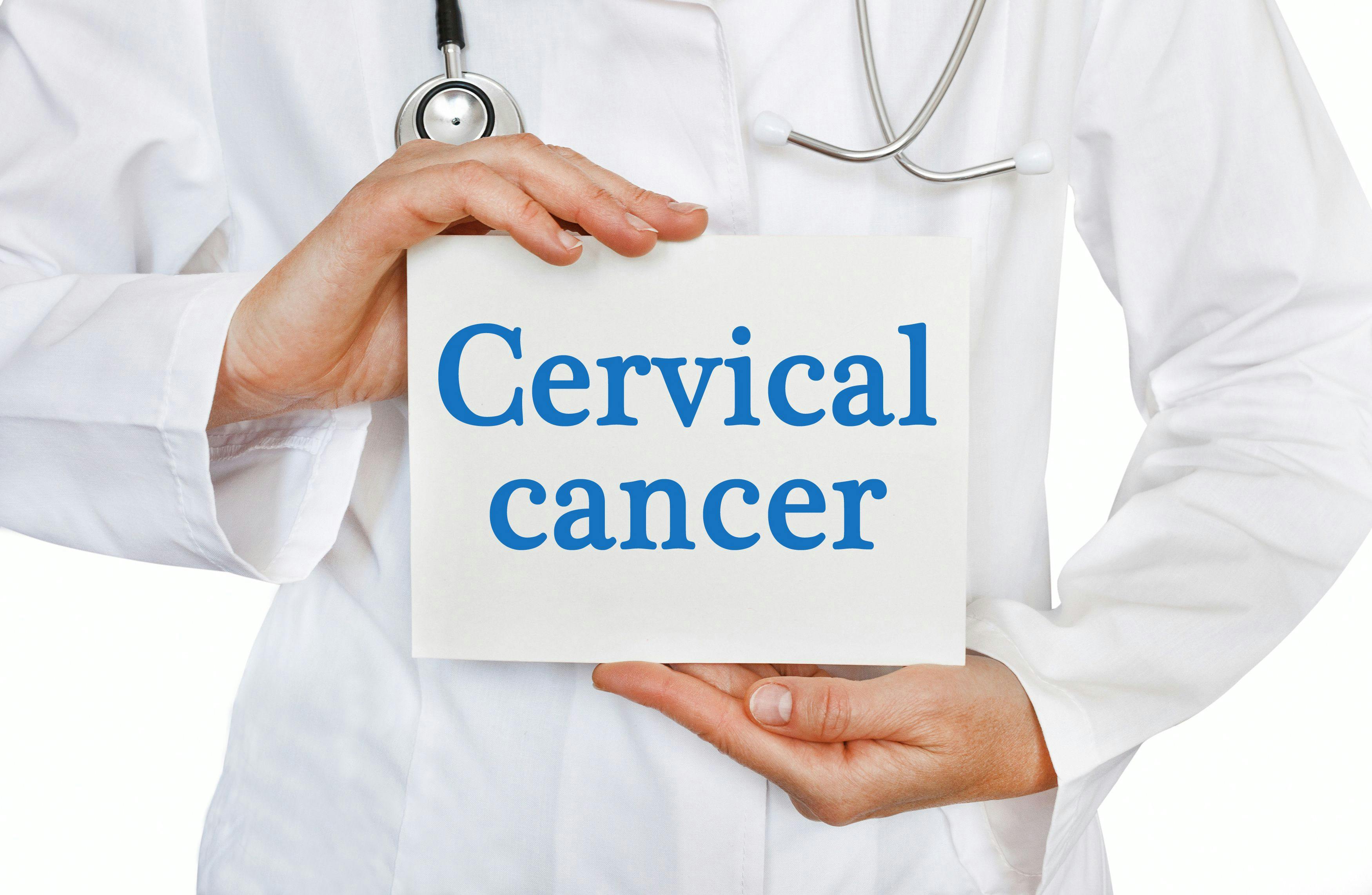 doctor holding clipboard that says, "cervical cancer" 