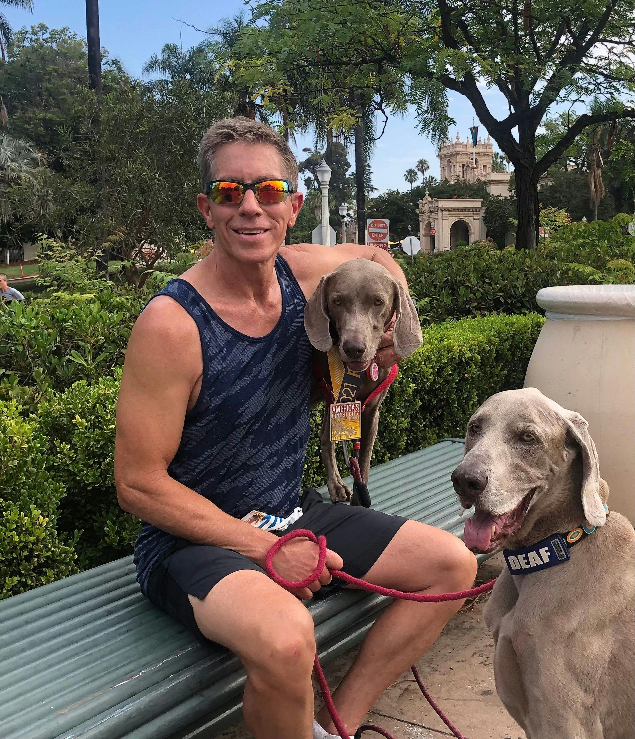 Mack after his most recent race, with his Weimaraners of course.