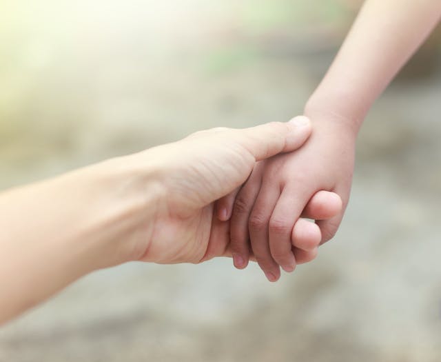 image of hand holding