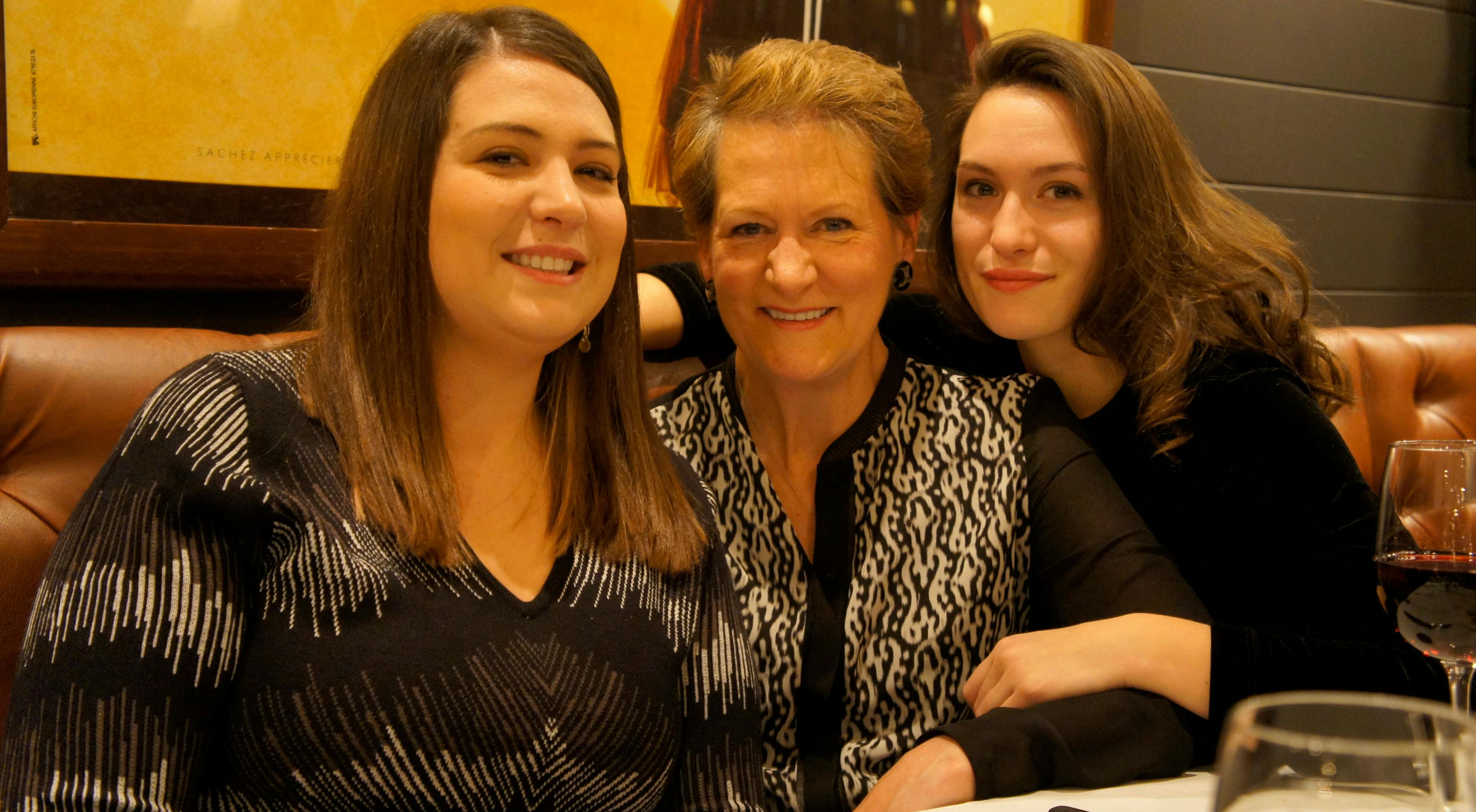 Carolyn with her daughters, Sydney and MacKenzie, in 2014, the year she went flat.