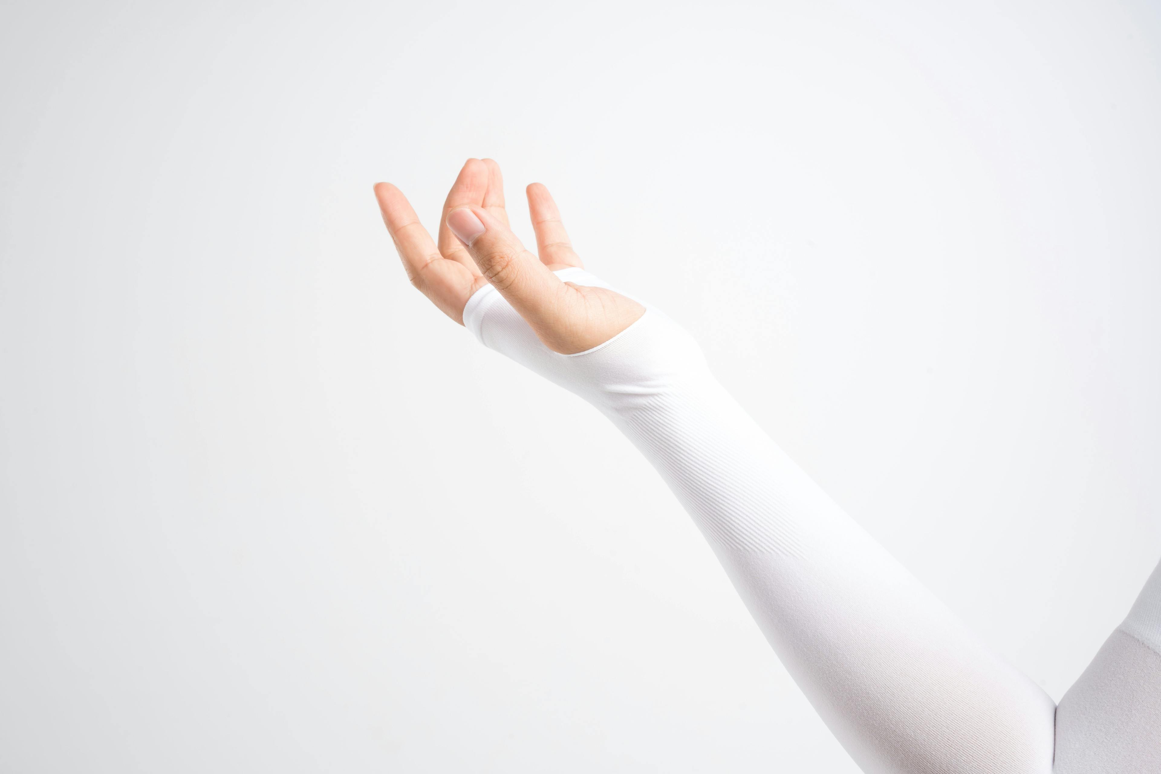 Lymphedema arm garment: Hand with elastic wrist and arm support for relieve injury | Image credit: © - bonnontawat © - stock.adobe.com