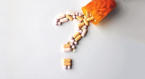 question mark made of pills
